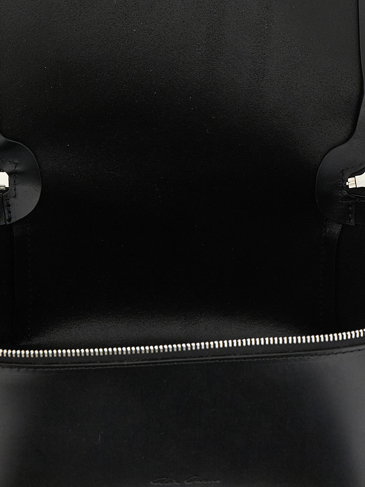 Travel Makeup Bag by Rick Owens for men in calfskin leather black & silver features a on trend silhouette, showcasing the on trend design of the Calfskin Leather Travel Makeup Bag with a secure zipper, ample , and versatile handle.