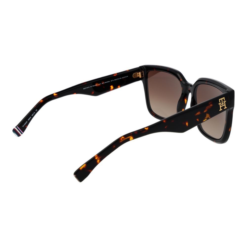 Sunglasses by Tommy Hilfiger for women in acetate black showcases a ethereal silhouette, featuring black coloured frame full-rim square frame design with gradient category-3-dark-tint lens for a ethereal finish.