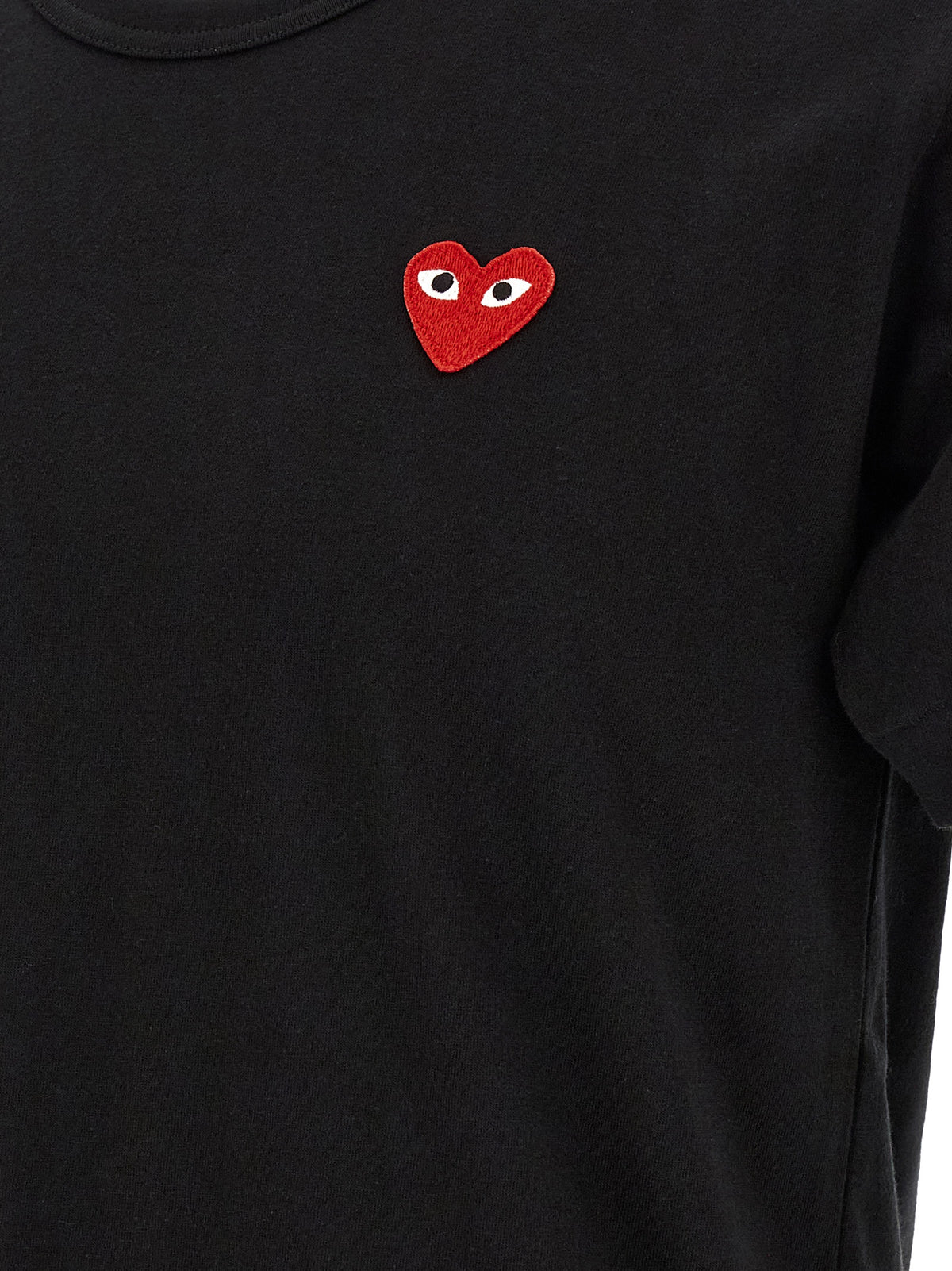 T-Shirt by Comme Des Garçons Play for men in cotton black & red showcases a unassuming silhouette, artfully detailed with a refined and unassuming for a sophisticated, contemporary look.
