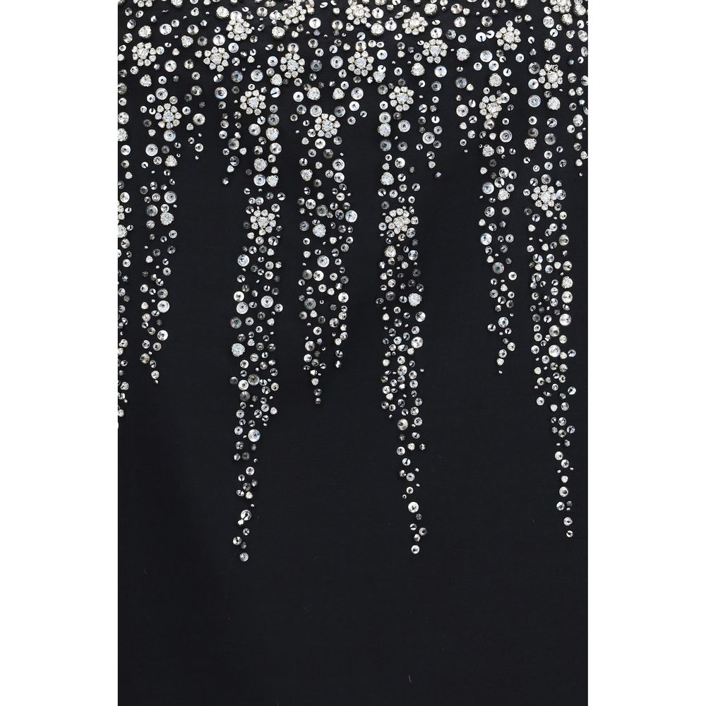 Dress by Valentino Garavani for women in virgin wool silk merino wool & crepe black, patterned & floral features an eye catching silhouette with a sophisticated , elegant , and a refined short mini for a eye catching aesthetic.