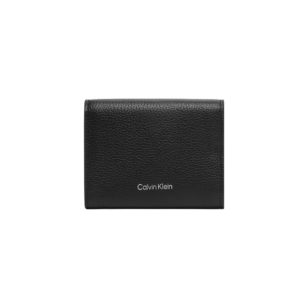 Wallet by Calvin Klein for women in pebbled leather black & signature features a sleek silhouette, showcasing the sleek Pebbled Leather Wallet design with sophisticated compact-design trifold coin-purse for a premium look.