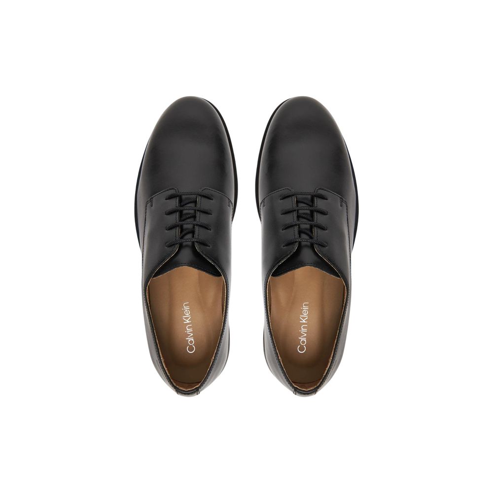 Lace-Up Shoes by Calvin Klein for men in leather black features an effortless chic silhouette, showcasing the Men's Leather Lace-Up Shoes design with an effortless chic and a for a effortless chic look.