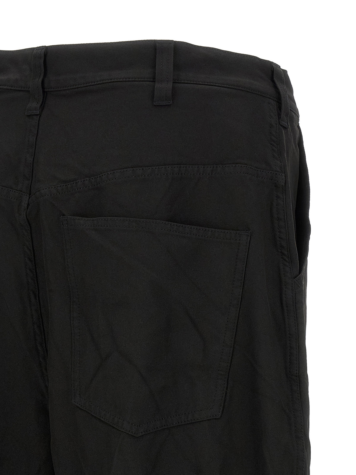 Trousers by Comme Des Garçons for men in polyester black features a tailored silhouette with a tailored relaxed-fit & wide, defined by its long and a sophisticated .