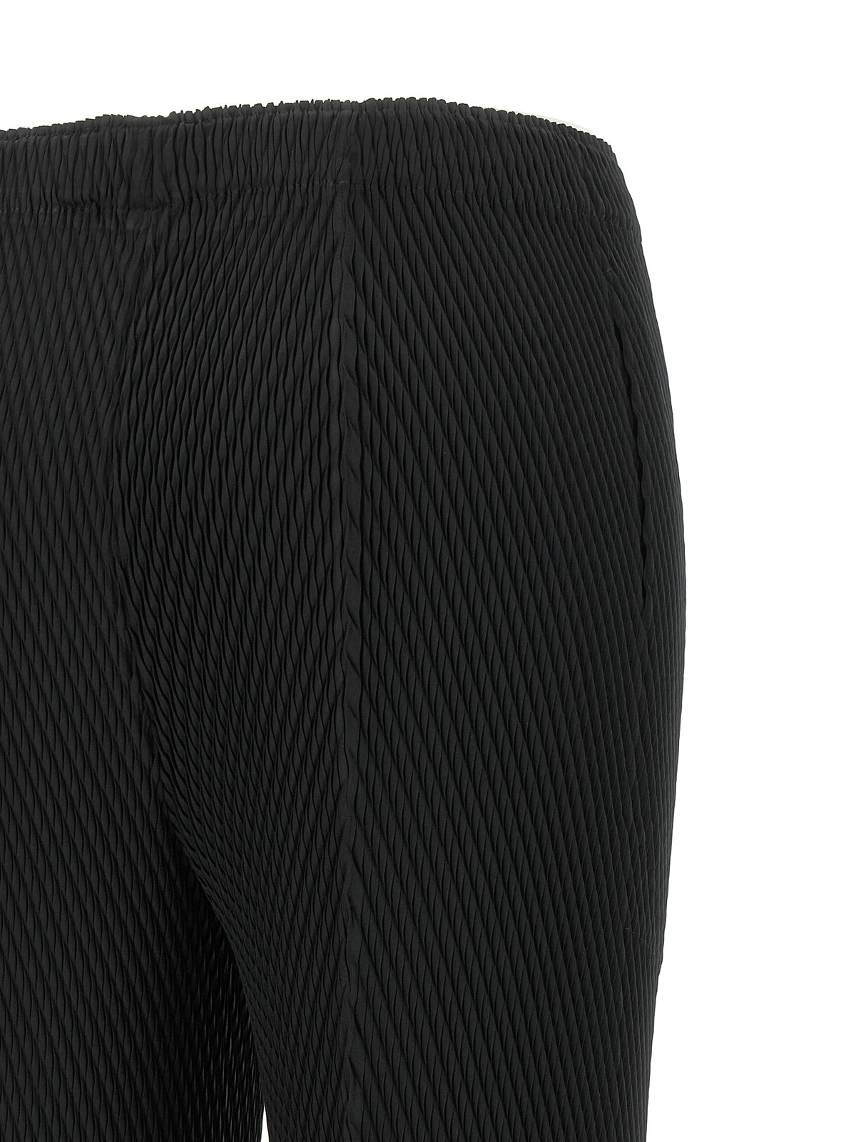 Trousers by Issey Miyake for women in polyester black features an sartorial silhouette, showcasing a precise straight & cropped and cropped with a sartorial for a refined look.