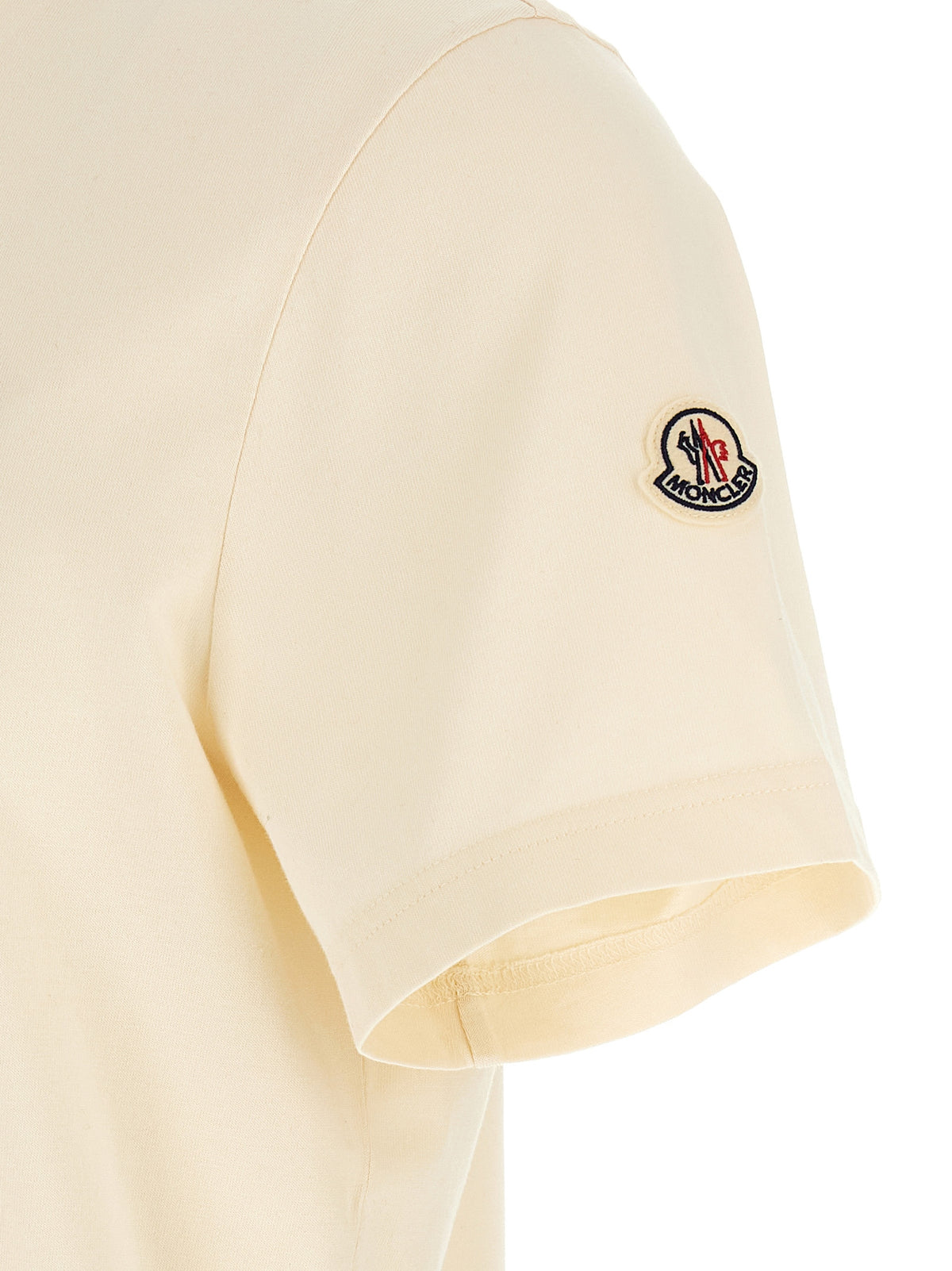 T-Shirt by Moncler for men in cotton felt ivory, white & signature features an edgy silhouette, meticulously detailed with a sophisticated and for a truly edgy finish.