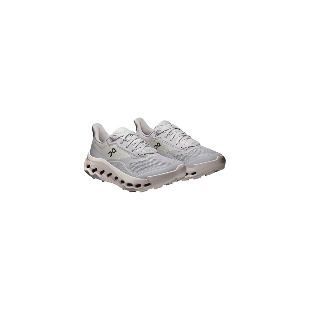 Athletic Sneakers by On Running for women in synthetic gray features an effortless chic silhouette, showcasing the signature athletic style of the Women's Athletic Synthetic Sneakers collection with a truly effortless chic finish.