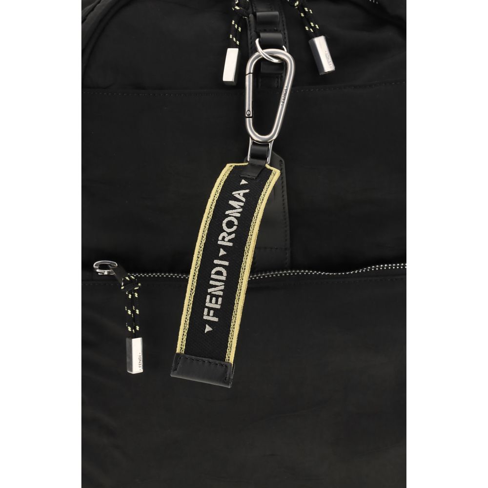 Large Backpack by Fendi for men in calfskin & polyamide black, silver & patchwork showcases a urban-chic Ribbon Calfskin & Polyamide Large Backpack design, featuring a secure zipper with urban-chic external-pockets & internal-pockets and versatile backpack-strap, adjustable-strap & handle.
