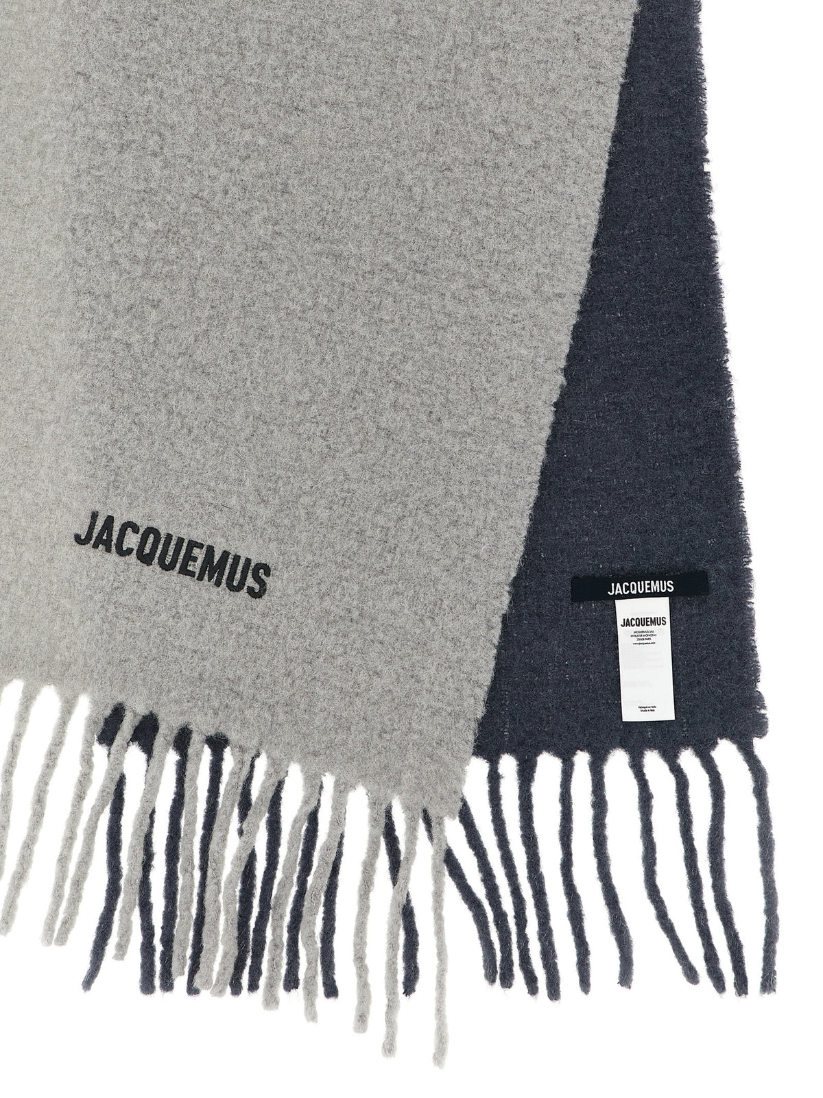 Scarf by Jacquemus for men in alpaca wool gray showcases a warm silhouette from the Alpaca Wool Wrap Fringes Scarf collection, offering a warm drape that exudes sophisticated luxury.