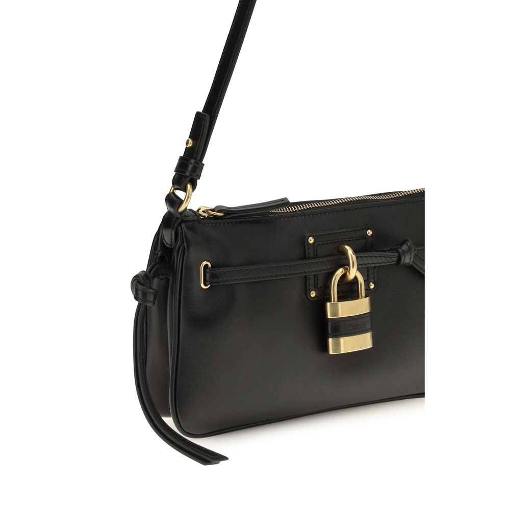 Mini Shoulder Bag by Chloé for women in bos taurus calf & lambskin leather black & signature showcases a enviable silhouette, artfully detailed with a secure zipper, organized internal-pockets, and versatile shoulder-strap & belt-strap for a enviable look.