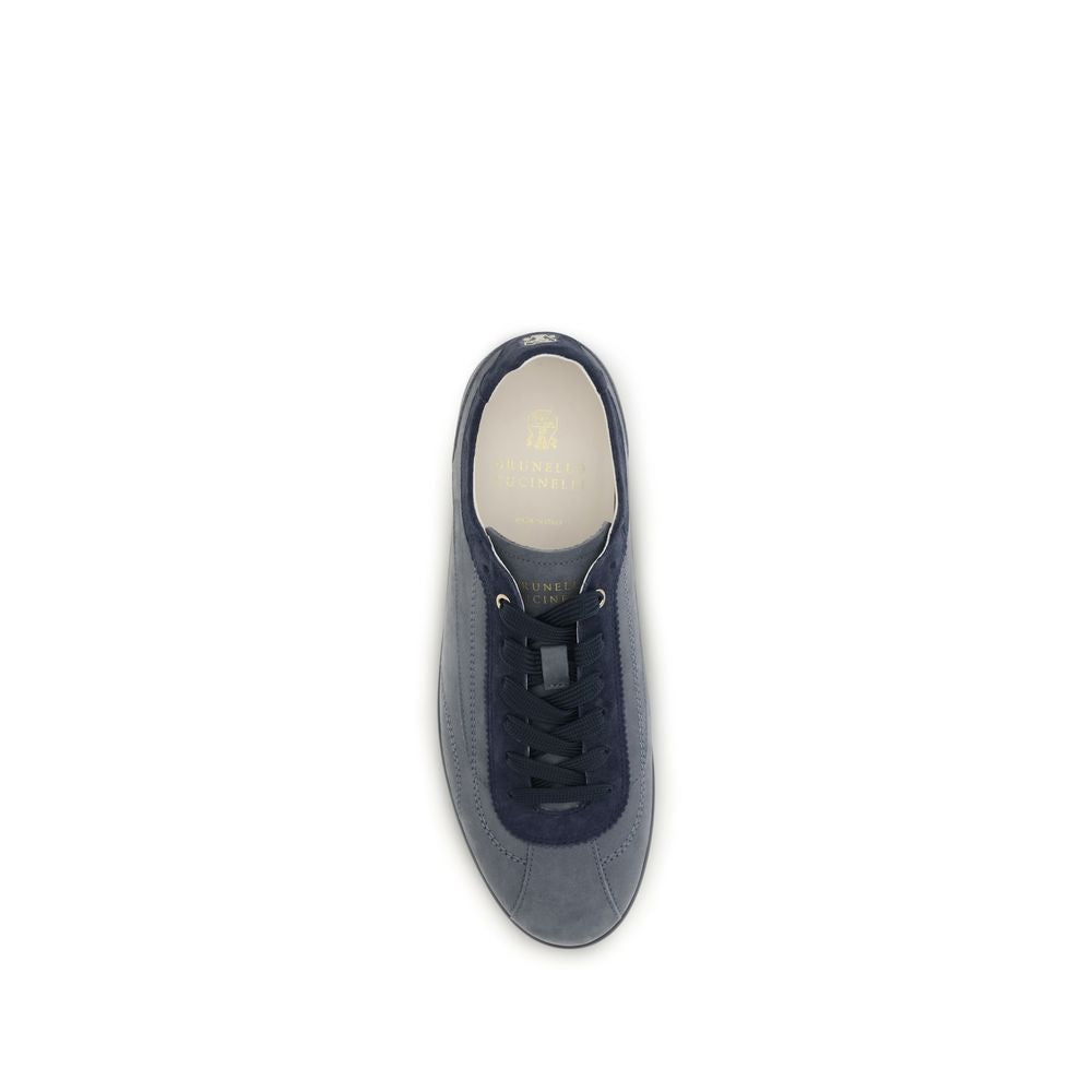 Sneakers by Brunello Cucinelli for men in bos taurus nubuck suede calf leather gray presents a on trend silhouette from the Men's Low Top Bos Taurus Nubuck Suede Calf Leather Sneakers collection, showcasing a on trend low-top style for an elevated aesthetic.