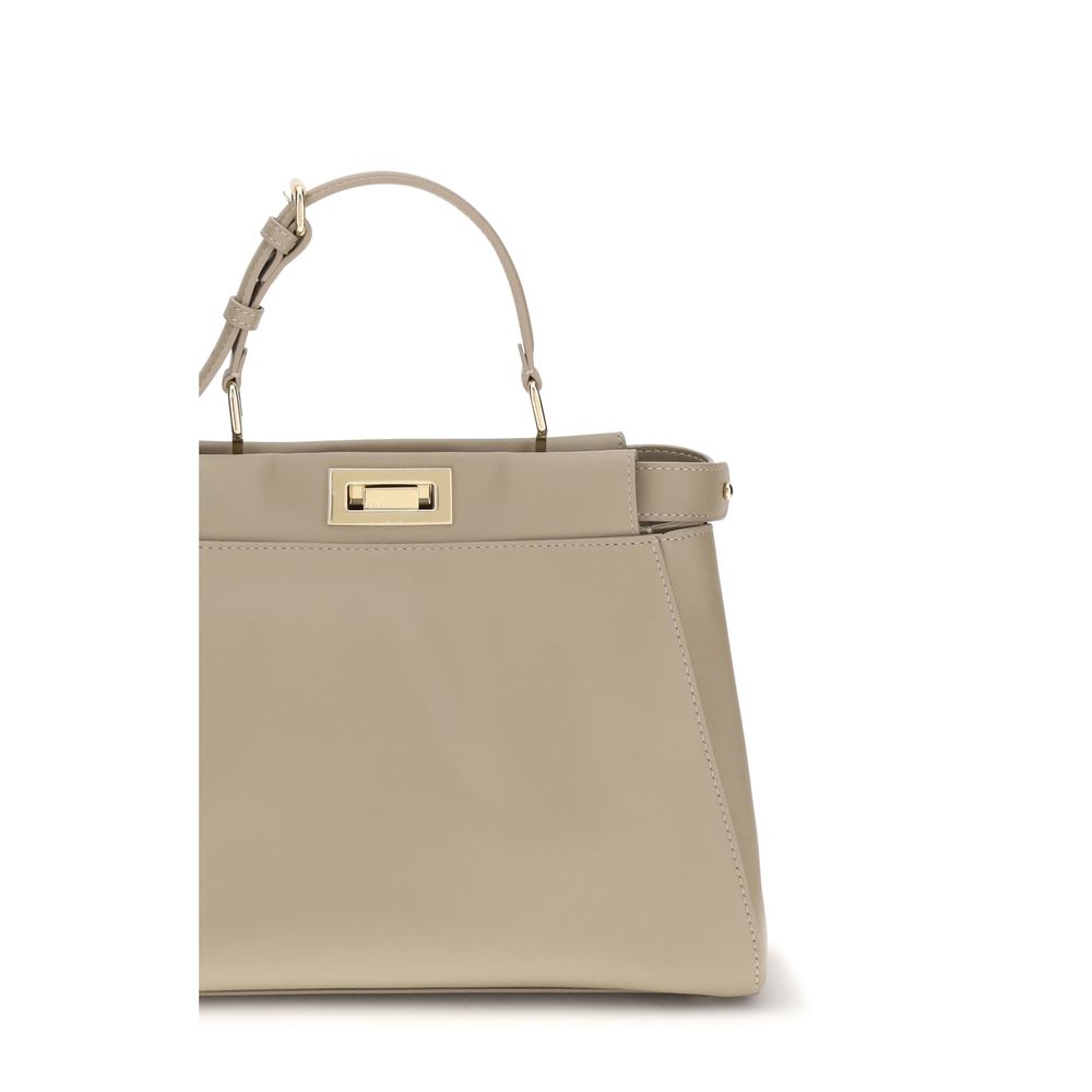 Small Shoulder Bag by Fendi for women in bos taurus calf grained leather beige, gold & signature features a distinguished silhouette, showcasing a secure and distinguished with versatile shoulder-strap, adjustable-strap & handle for a distinguished finish.