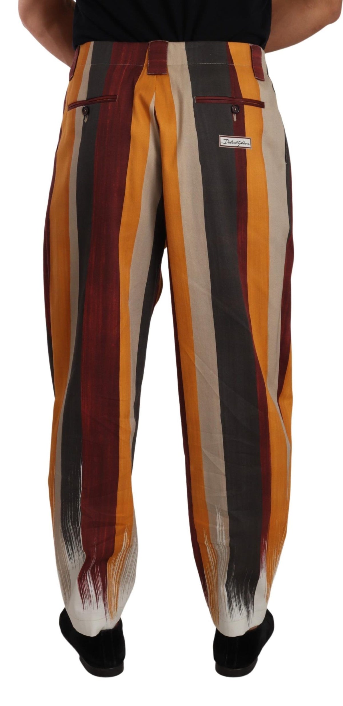 Trousers by Dolce & Gabbana for men in cotton & flax multicolor & striped presents a perennial silhouette, meticulously tailored with a tapered-leg, skinny & regular-fit cut, long finish, and an elegant .