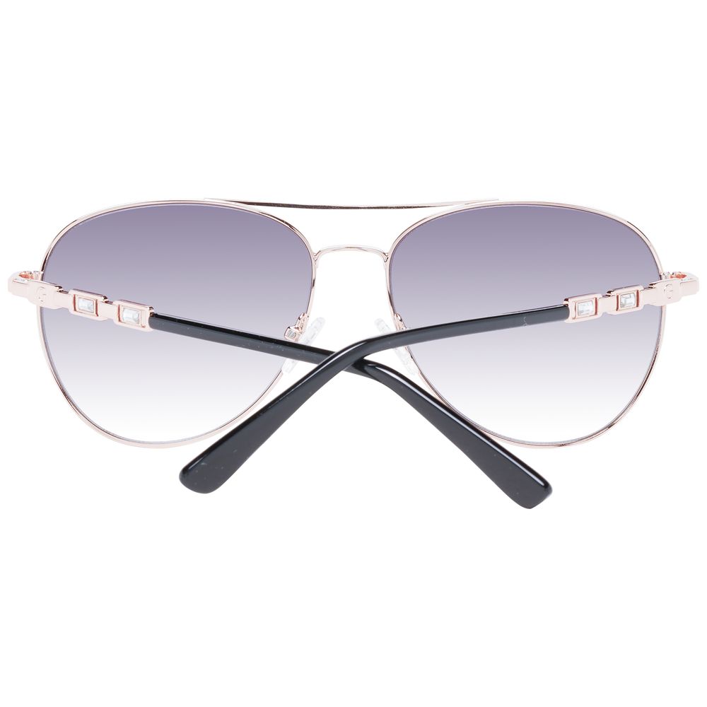 Sunglasses by Guess for women in metal rose-gold showcases a ethereal silhouette, featuring rose-gold coloured frame aviator full-rim frame design with gradient category-3-dark-tint lens for a ethereal finish.