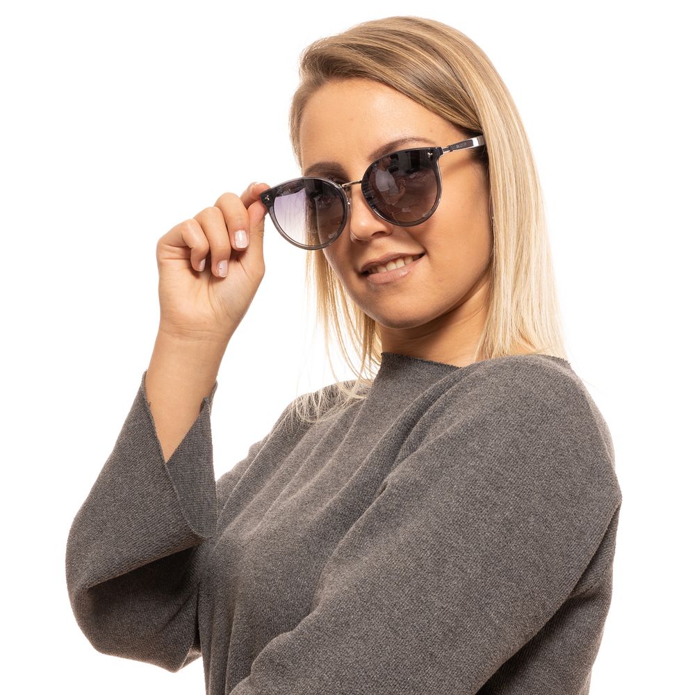 Sunglasses by Bally for women in and gray featuring an opulent full-rim round frame design with a sophisticated gray coloured frame finish and high-performance mirrored category-3-dark-tint lens.
