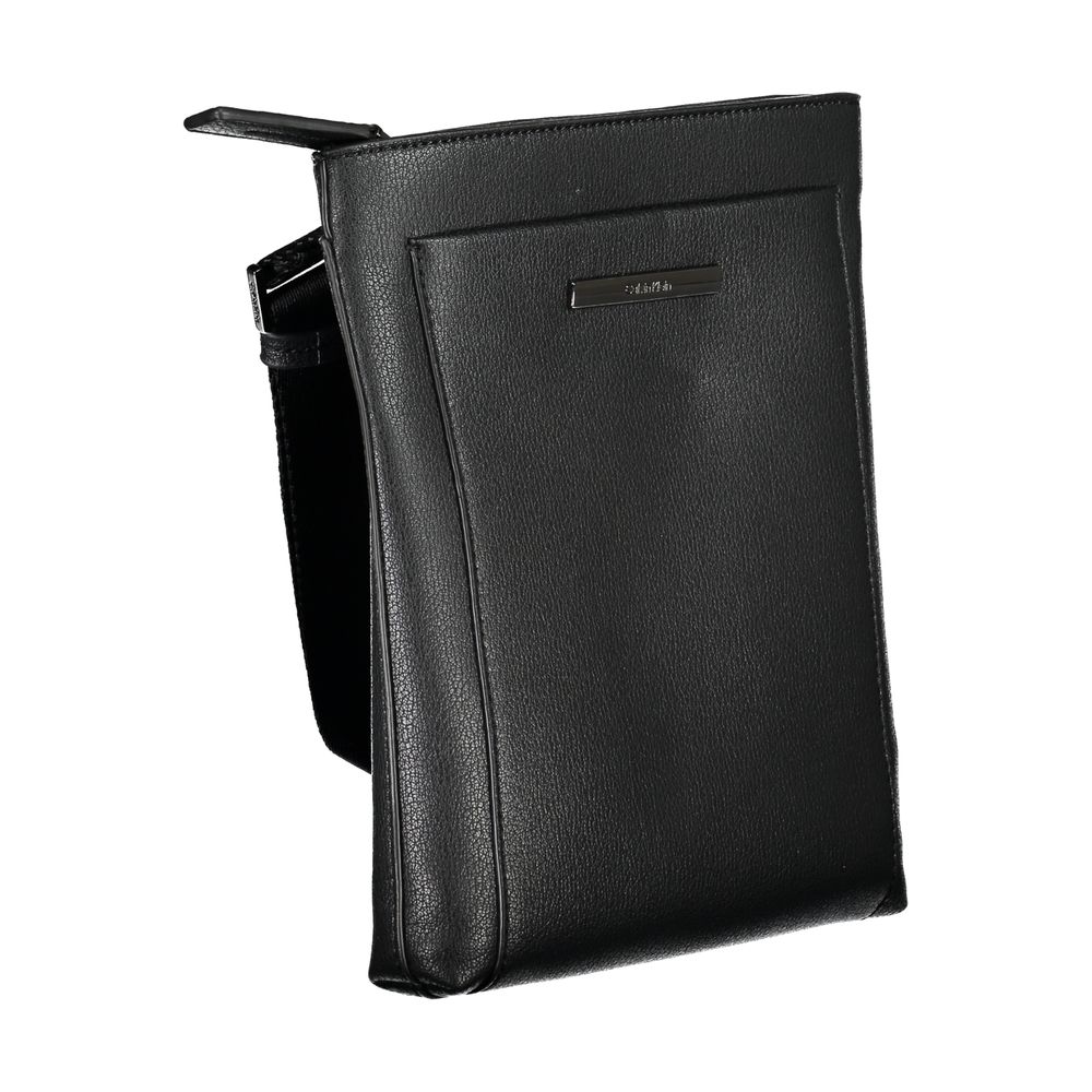 Shoulder Bag by Calvin Klein for men in polyester & polyethylene black features a effortless sophistication silhouette, secured by a zipper with ample external-pockets & internal-pockets and versatile shoulder-strap & adjustable-strap for a effortless sophistication finish.