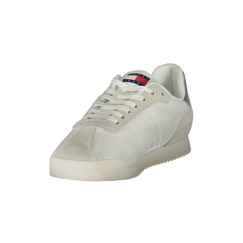 Sneakers by Tommy Hilfiger for women in polyester white features an sumptuous silhouette, showcasing the premium Essence Women's Fashion Polyester Sneakers in a sumptuous fashion style that offers a sumptuous finish for refined style.