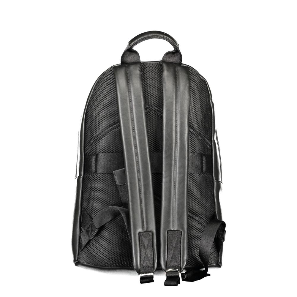 Backpack by Calvin Klein for men in polyester & polyethylene black presents a versatile Explorer Polyester & Polyethylene Backpack design, showcasing a secure with ample internal-pockets & laptop-compartment and versatile handle, backpack-strap & adjustable-strap for a versatile finish.