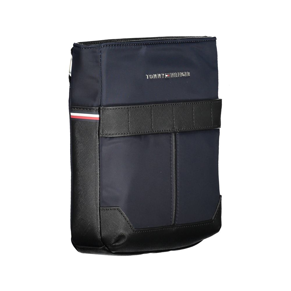 Shoulder Bag by Tommy Hilfiger for men in polyester & polyethylene blue presents a statuesque silhouette, showcasing a secure zipper and statuesque external-pockets & internal-pockets with versatile shoulder-strap & adjustable-strap for a sophisticated look.