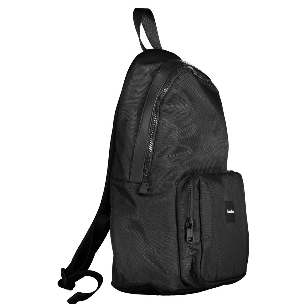 Backpack by Calvin Klein for men in polyester & polyethylene black & green presents a stately Polyester & Polyethylene Backpack design, showcasing a secure with ample and versatile backpack-strap & adjustable-strap for a stately finish.