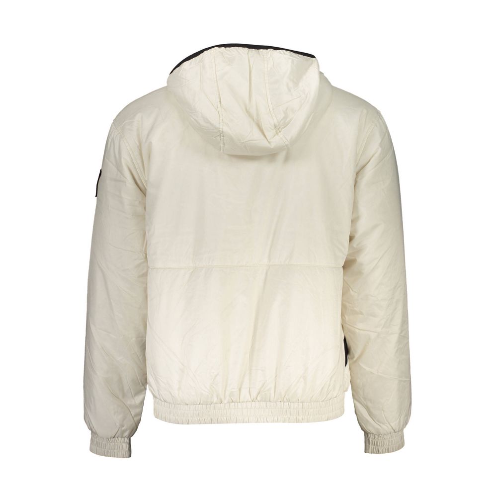 This Hooded Jacket by Calvin Klein for men in polyester beige showcases a magnificent silhouette, meticulously crafted with a distinctive and functional pockets & hooded for a magnificent finish.