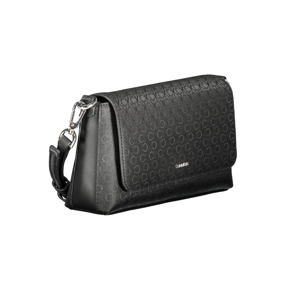 Crossbody Handbag by Calvin Klein for women in polyester & polyethylene black & jacquard features a ornamental silhouette, showcasing a secure , ample internal-pockets & cardholder, and ornamental crossbody-strap, adjustable-strap, detachable-strap & handle for a sophisticated look.