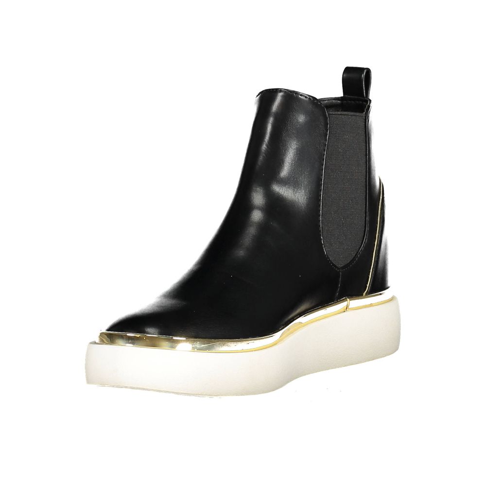 Boots by U.S. POLO ASSN. for women in polyester & polyethylene black features an high-performance silhouette, showcasing the sophisticated design of the Women's Polyester & Polyethylene Boots with a and a refined .