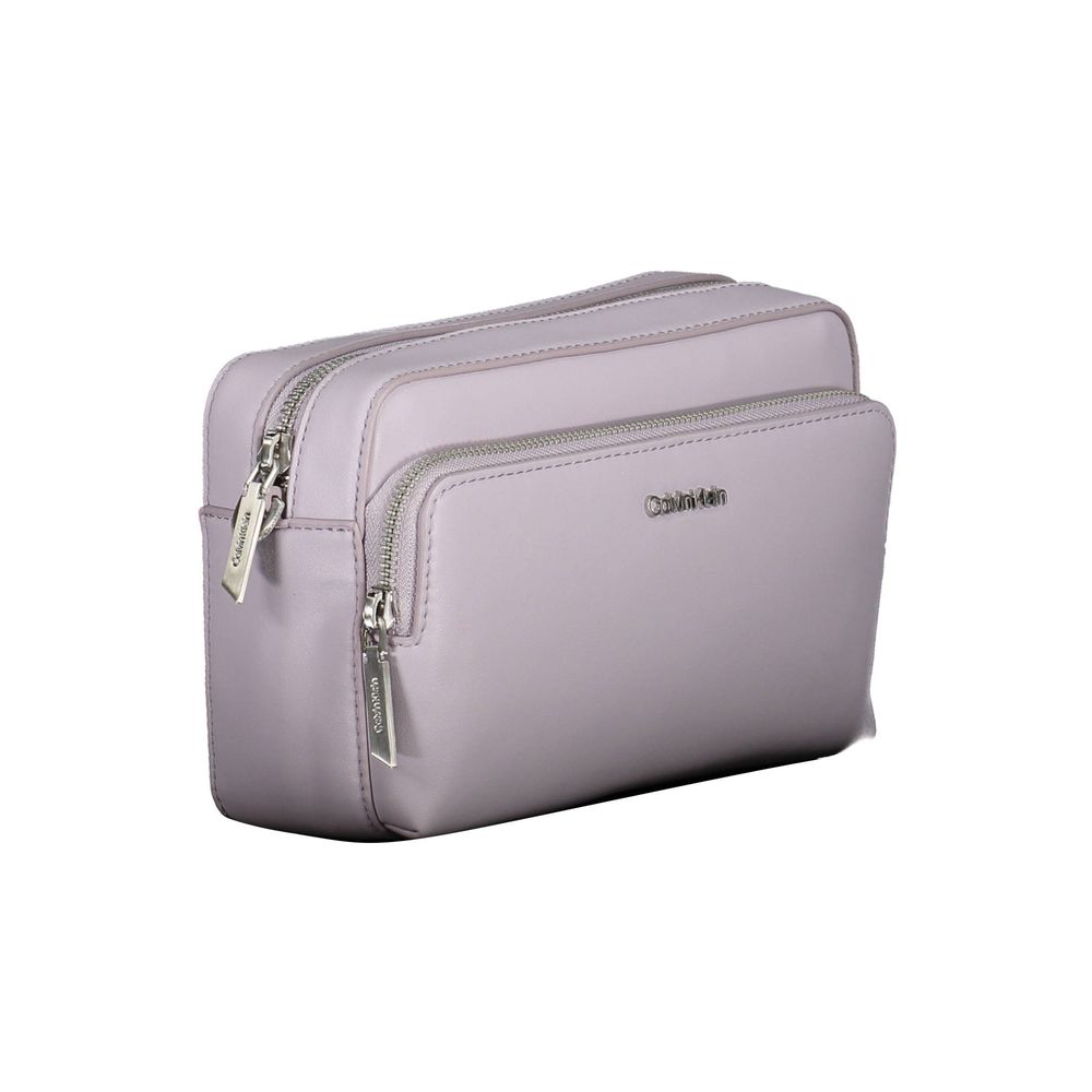 Shoulder Convertible Handbag by Calvin Klein for women in polyester purple presents a exquisite silhouette, showcasing a secure zipper and organized internal-pockets with versatile shoulder-strap & adjustable-strap.