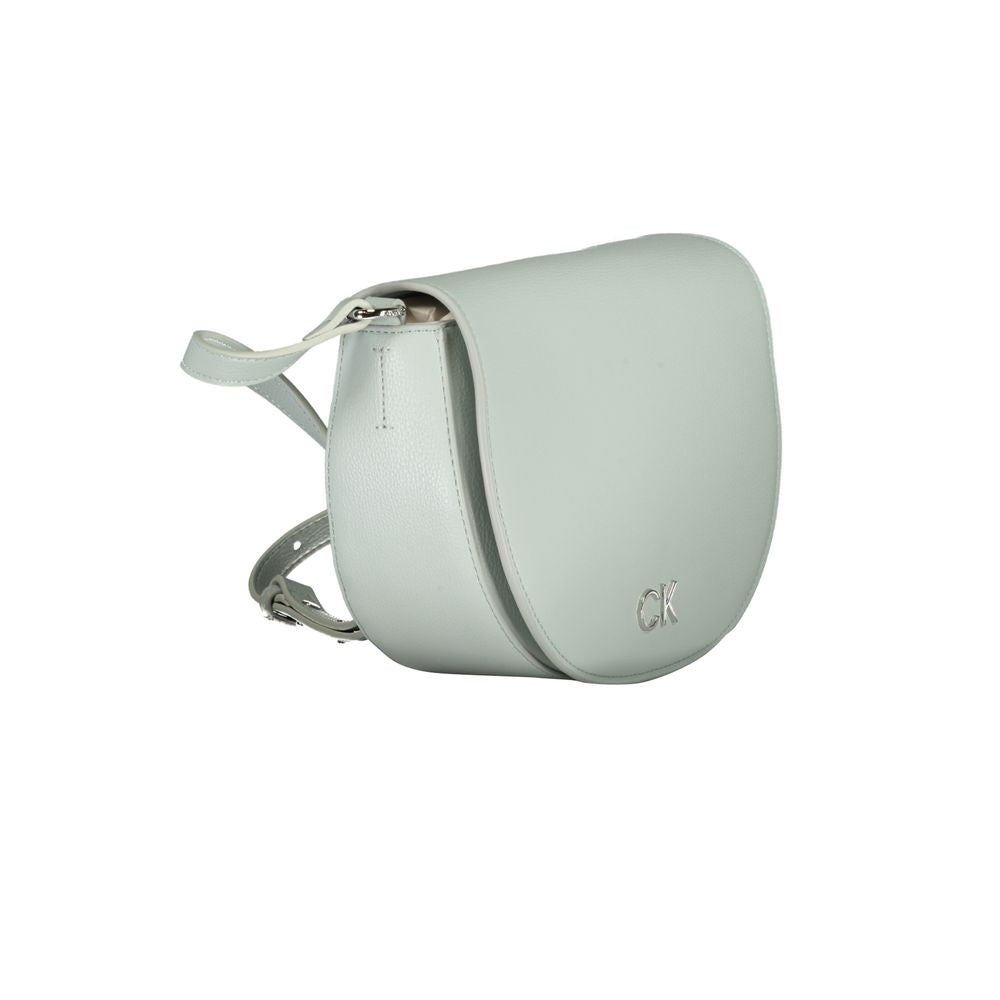 This Small Crossbody Handbag by Calvin Klein for women in polyethylene faux leather and light-blue presents a sculptural silhouette featuring a secure magnetic, ample cardholder, and versatile crossbody-strap & adjustable-strap for a sculptural finish.
