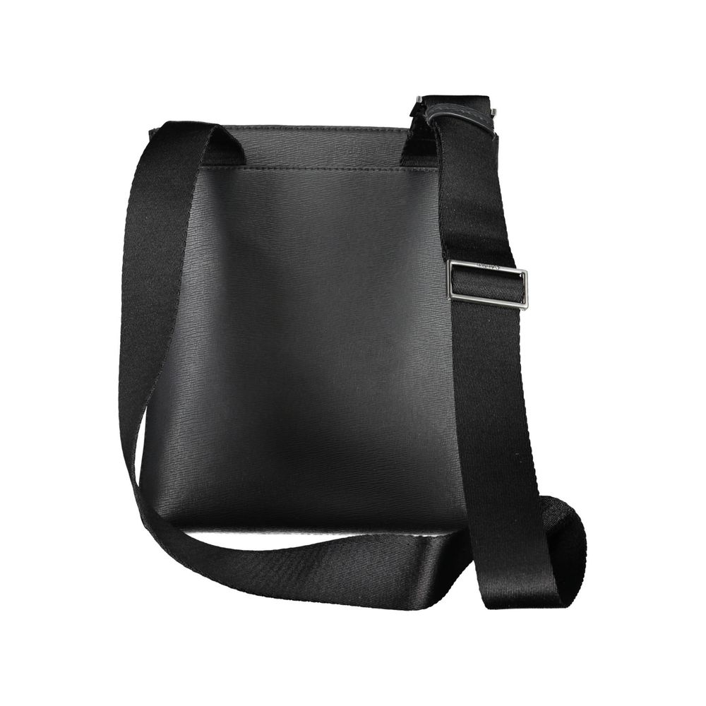 Shoulder Bag by Calvin Klein for men in polyester & polyethylene black features a effortless sophistication silhouette, secured by a zipper with ample external-pockets & internal-pockets and versatile shoulder-strap & adjustable-strap for a effortless sophistication finish.