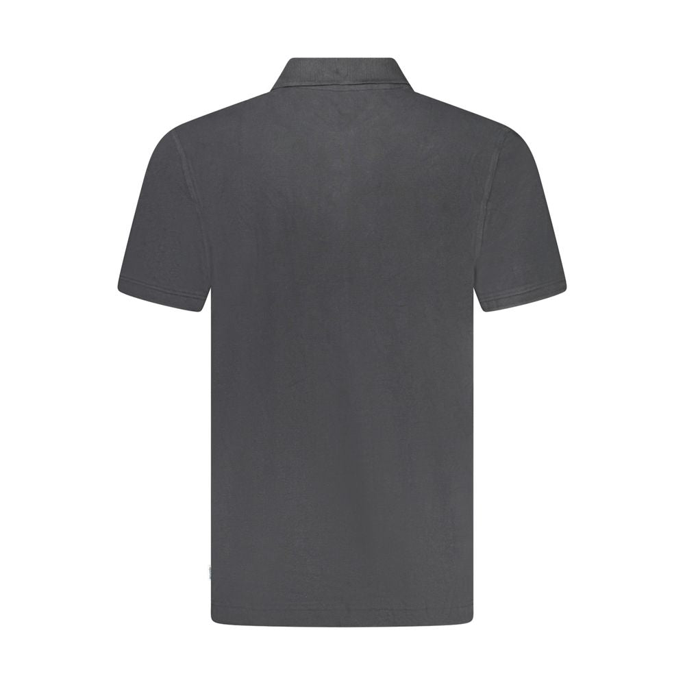 Polo Shirt by Wrangler for men in cotton black presents a distinguished silhouette, showcasing a sophisticated and distinguished for a truly distinguished finish.