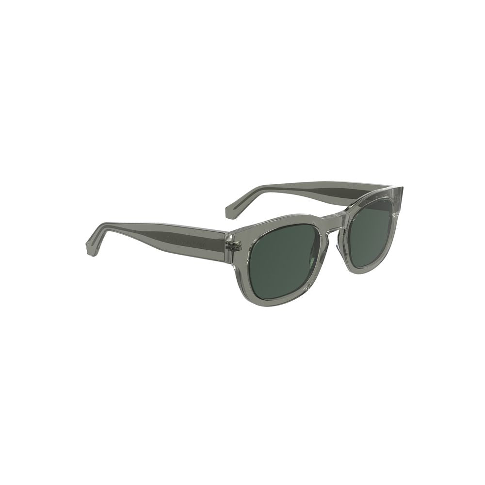 Sunglasses by Calvin Klein for women in metal gray & signature showcases a ethereal silhouette, featuring gray coloured frame round frame design with for a ethereal finish.