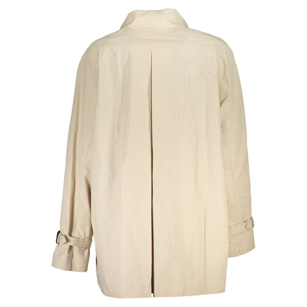 This Tommy Hilfiger women cotton Trench Coat in beige presents a high style silhouette, meticulously detailed with pockets and a high style for a sophisticated, timeless look.