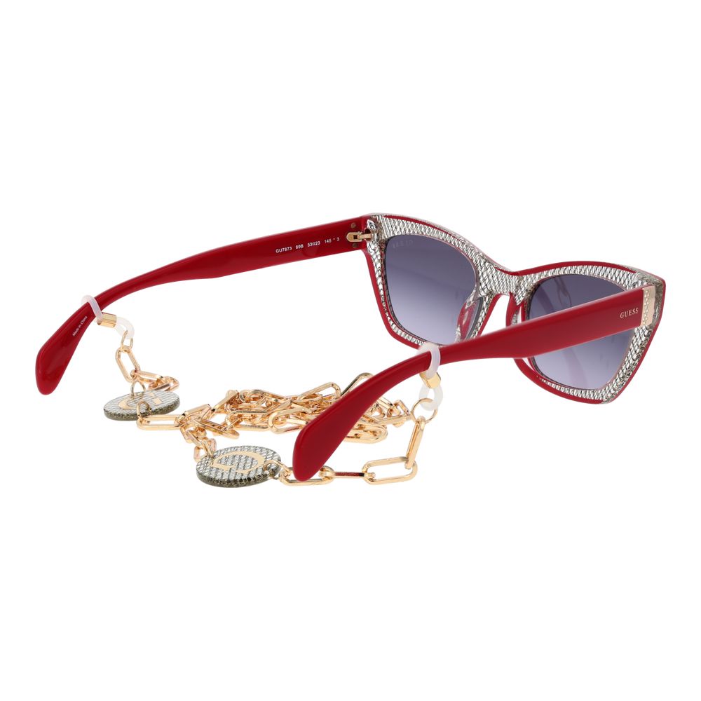 This Sunglasses by Guess for women in metal & plastic gradient, gray & red presents a sumptuous silhouette, showcasing a sumptuous cat-eye full-rim frame design in red coloured frame and high-performance category-3-dark-tint gradient lens.