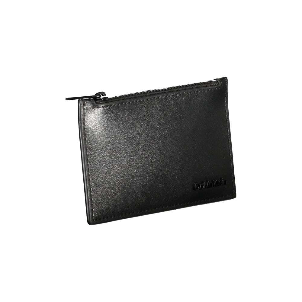 Cardholder Wallet by Calvin Klein for men in leather black showcases a refined silhouette, artfully detailed with the signature style of the Leather Cardholder Wallet and functional card-organization bifold.