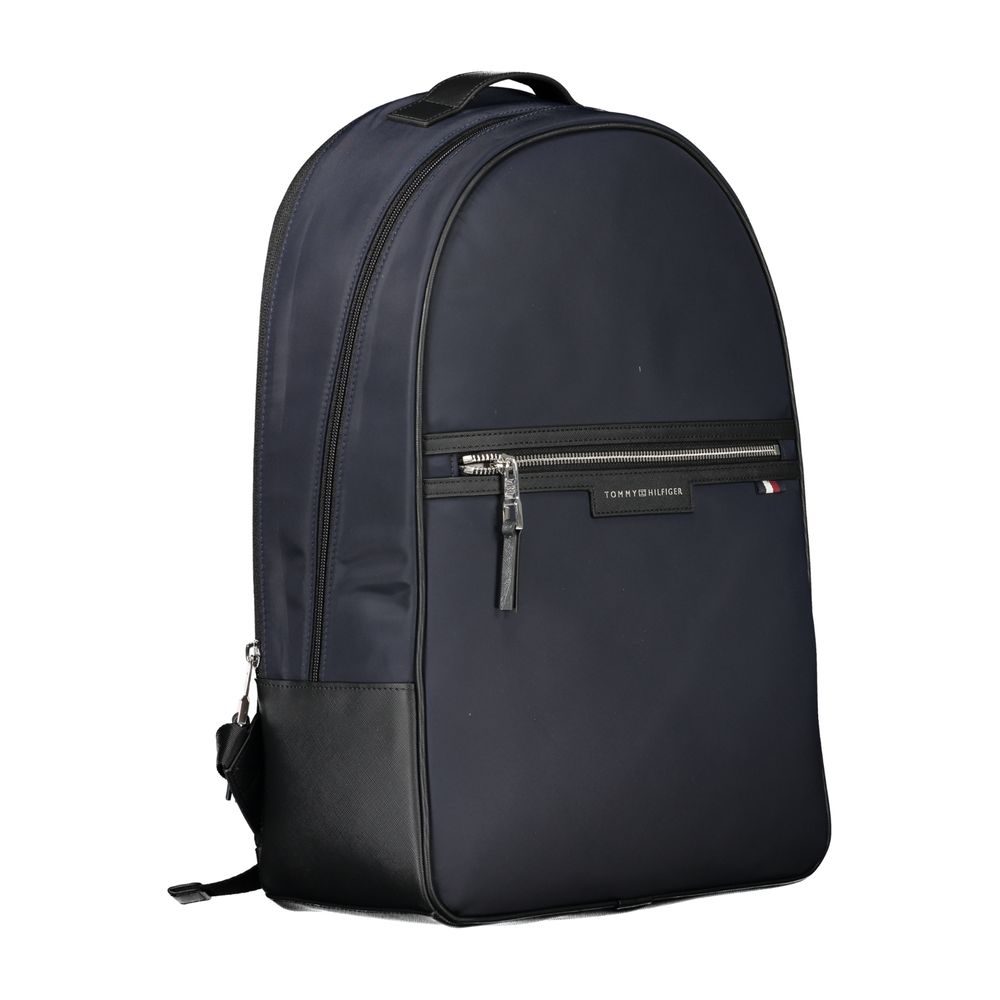 Backpack by Tommy Hilfiger for men in polyester blue & signature showcases an architectural Polyester Backpack design, featuring a secure zipper, ample external-pockets & laptop-compartment, and architectural backpack-strap, adjustable-strap & handle for a sophisticated look.
