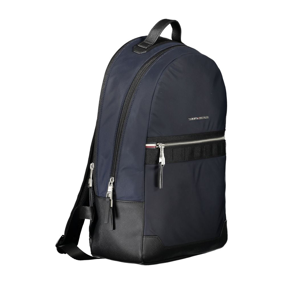 Backpack by Tommy Hilfiger for men in polyester blue features an stately silhouette from the Polyester Backpack range, with a secure zipper, ample external-pockets & laptop-compartment, and versatile backpack-strap, adjustable-strap & handle.