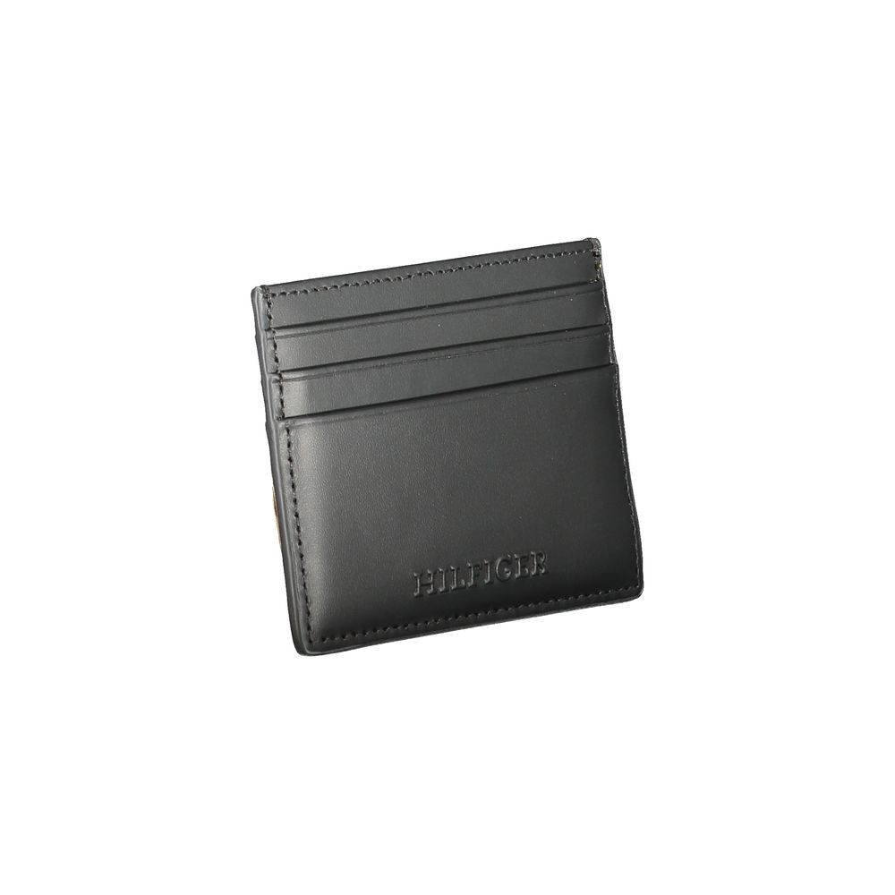 Cardholder Wallet by Tommy Hilfiger for men in leather black showcases a refined silhouette, artfully detailed with the signature style of the Leather Cardholder Wallet and functional card-organization.