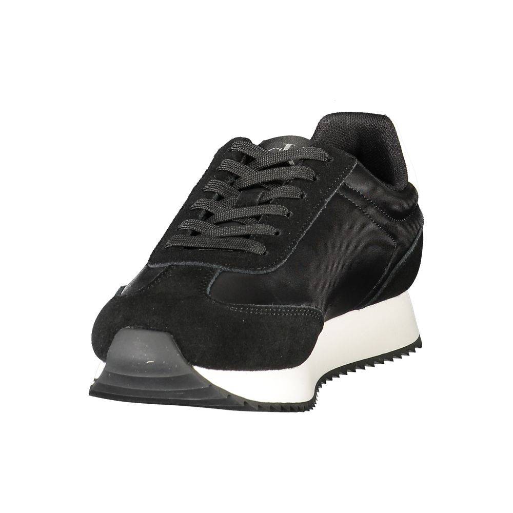Sneakers by Calvin Klein for women in polyester polyethylene leather black presents a sumptuous silhouette from the Women's Fashion Polyester Polyethylene Leather Sneakers collection, showcasing a sumptuous fashion style for an elevated aesthetic.