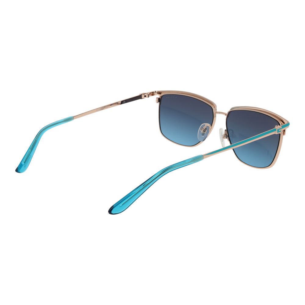 Sunglasses by Guess for women in metal and gold presents a sumptuous silhouette, featuring gold coloured frame and rectangle full-rim frame design with gradient category-3-dark-tint lens for a sumptuous look.