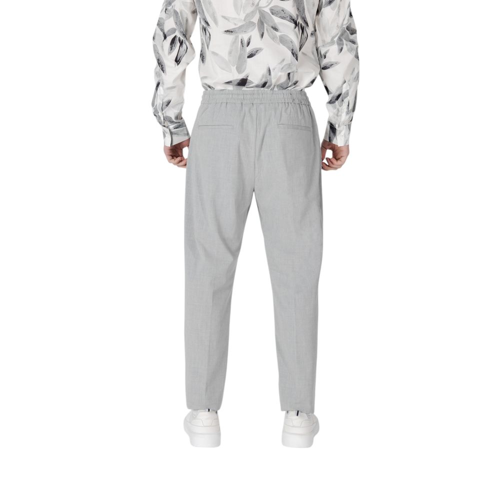 Trousers by Antony Morato for men in stretch polyester & viscose gray presents a smart silhouette, meticulously detailed with a smart regular-fit, a smart long, and a smart .