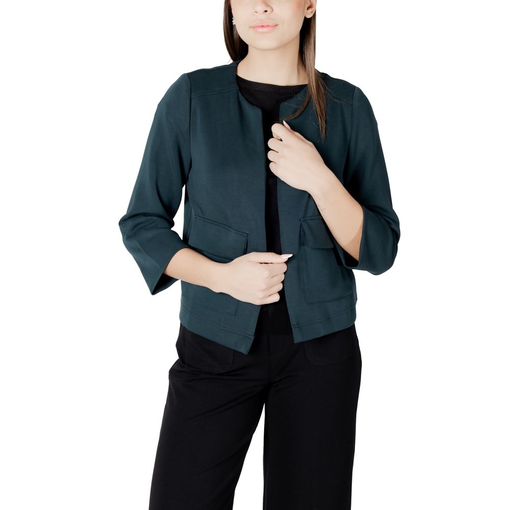 Vest by Street One for women in stretch polyester & modal green showcases a dynamic silhouette, perfectly balancing pockets with a dynamic for a sophisticated, high-fashion look.