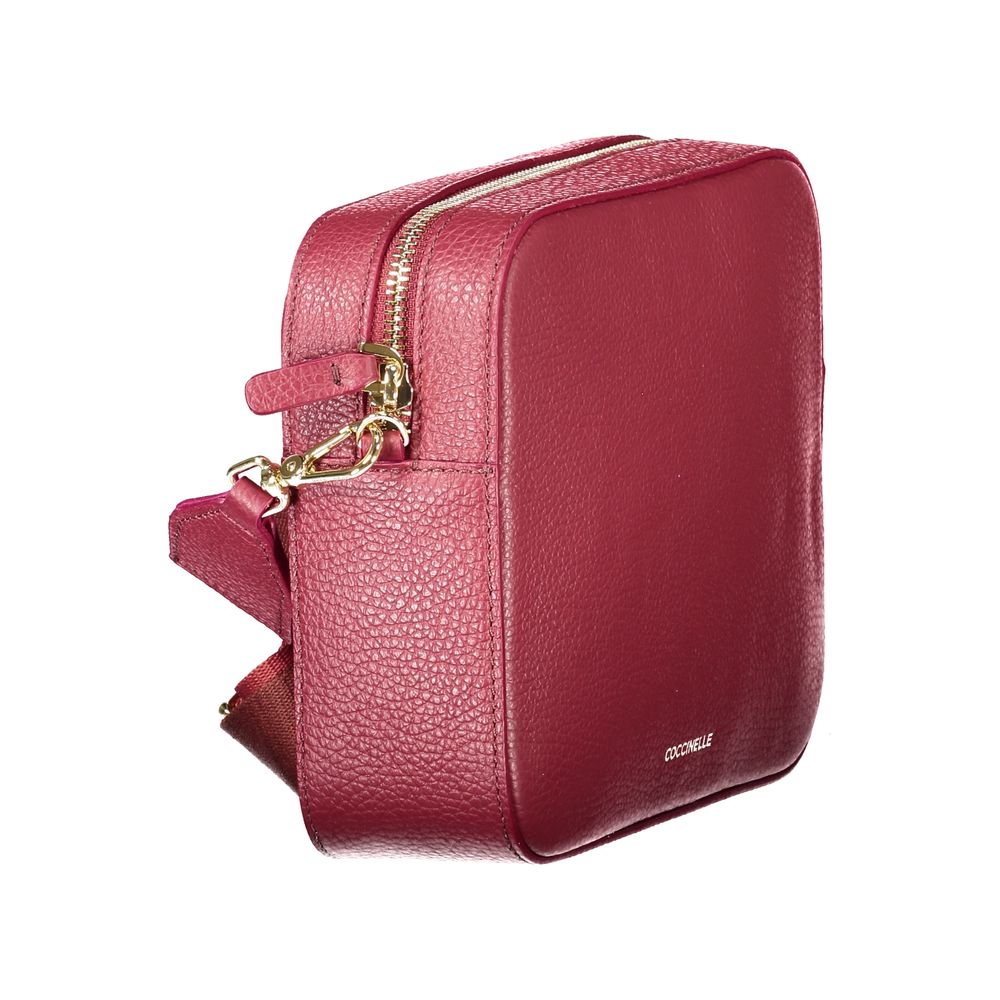 This Mini Handbag by Coccinelle for women in leather and red presents a sculptural silhouette featuring a secure zipper, ample , and versatile shoulder-strap & adjustable-strap for a sculptural finish.