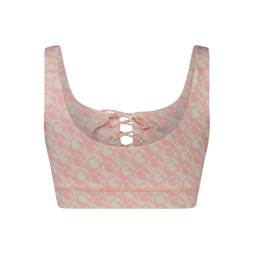Sport Bra by Guess Jeans for women in polyester pink features a comfortable silhouette, showcasing the comfortable design of this Women's Wide Polyester Sport Bra.
