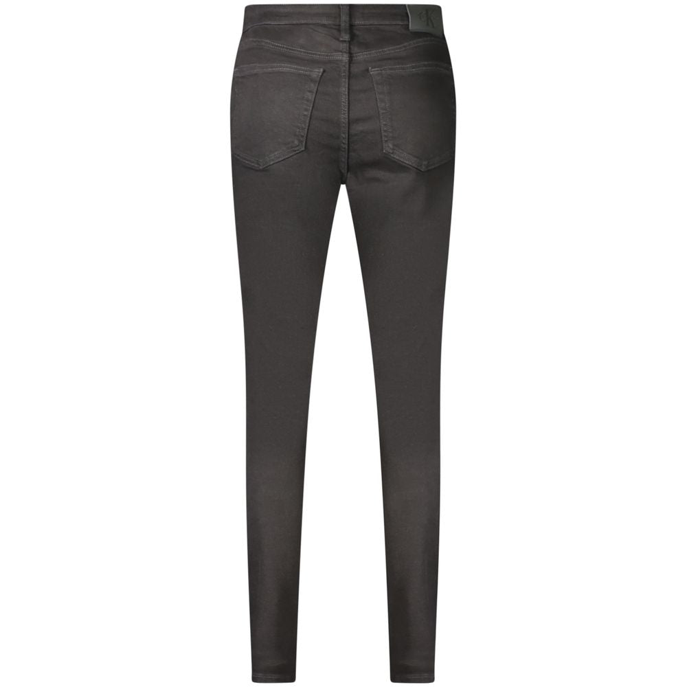 Jeans by Calvin Klein for women in denim cotton black presents a refined pantology silhouette, artfully defined by a refined pantology slim, long, and a sophisticated mid rise.