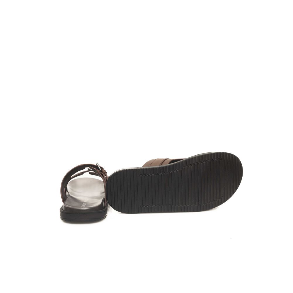 Flat Sandals by Cerruti 1881 for men in cowhide leather brown showcases a sculptural silhouette as Men's Cowhide Leather Flat Sandals, defined by a sculptural flat and sculptural for a sculptural look.