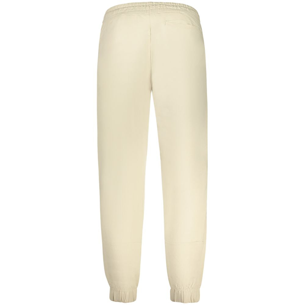 Joggers by Guess Jeans for men in cotton beige & print features a refined silhouette with a refined athletic, defined by a and a refined long for a refined finish.