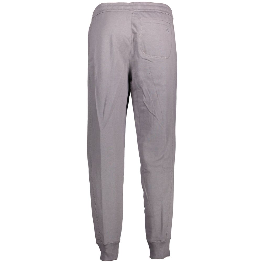 Trousers by Calvin Klein for men in cotton gray & print presents a perennial silhouette, meticulously tailored with a athletic cut, long finish, and an elegant .