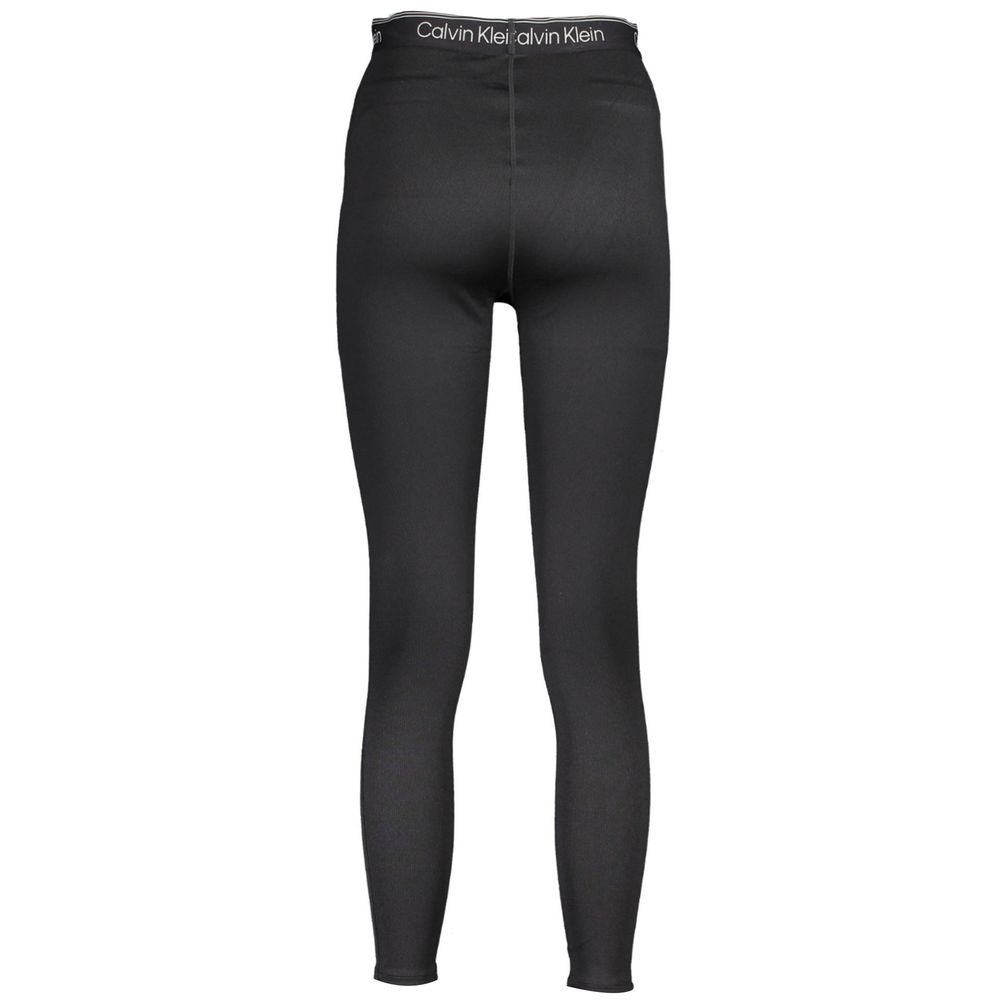 Activewear Leggings by Calvin Klein for women in polyester black & print features an versatile silhouette, showcasing with a versatile leggings, long, and for a high-performance look.