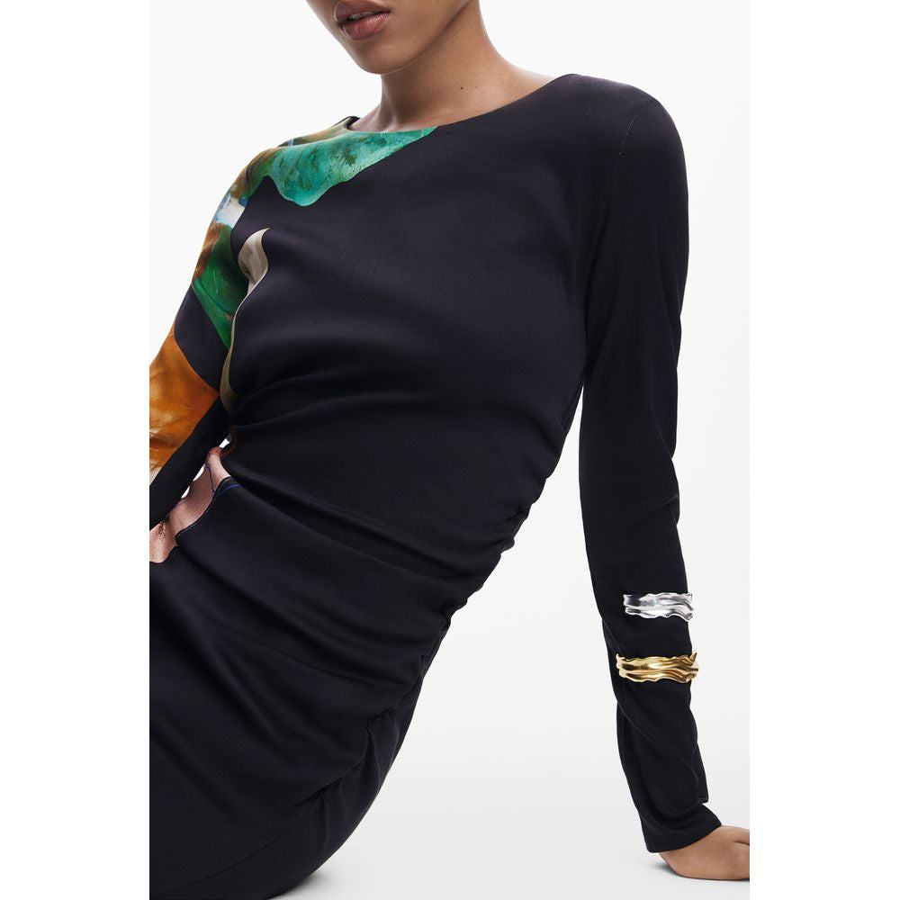 Dress by Desigual for women in stretch viscose black, patterned & print features a dramatic silhouette, showcasing an elegant and that flows into a dramatic midi long.