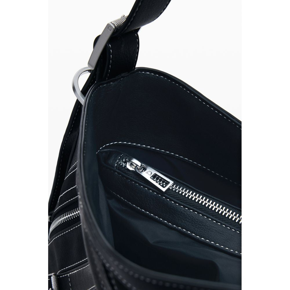 Shoulder Handbag by Desigual for women in polyester polyurethane & polyethylene black & brown presents a ornamental silhouette, showcasing a secure magnetic, ample built-in-compartments, and versatile shoulder-strap & adjustable-strap for a ornamental finish.